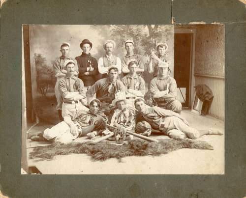 Early Base Ball Team With Mascot on Bearskin Rug